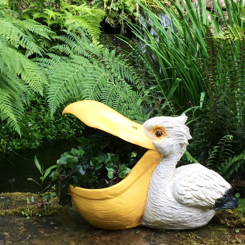 HomeStyles Life's a Beach Pelican Mouth Planter Statue & Reviews Wayfair